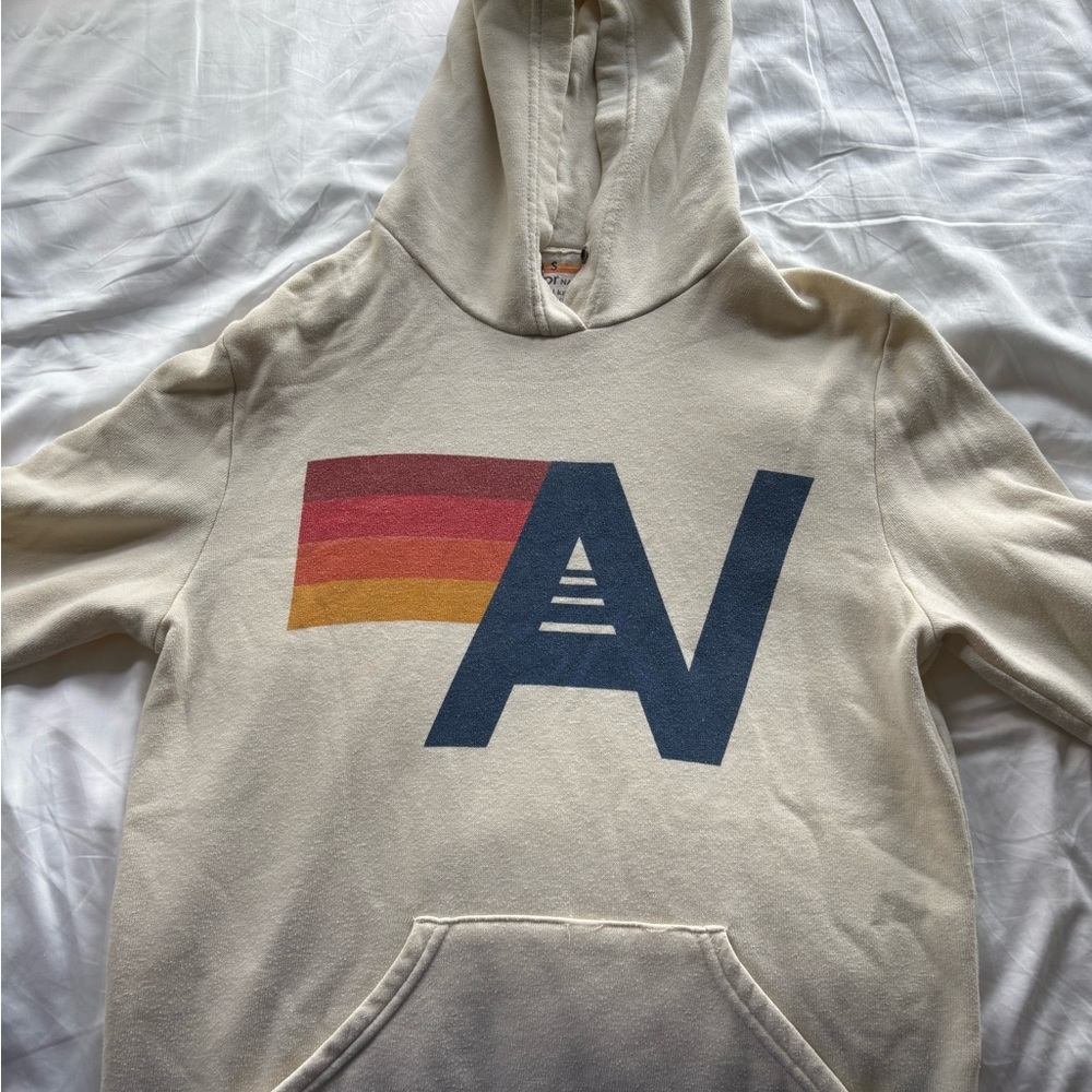 Lululemon Athletica Cream Hoodie with Graphic Design